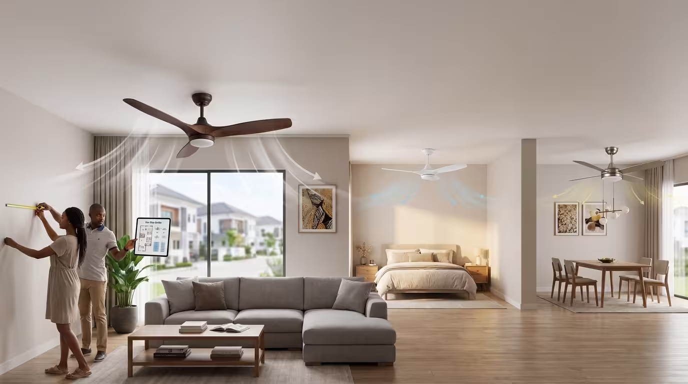 A Nigerian couple measures their living room wall while holding a fan size guide tablet, with three different ceiling fans shown across a living room, bedroom, and dining area, each displaying airflow direction arrows to illustrate correct fan sizing for different rooms.